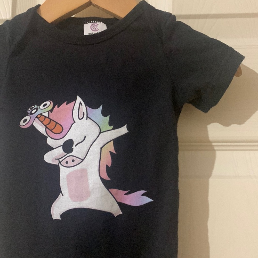 Dabbing unicorn with fidget spinner onsie